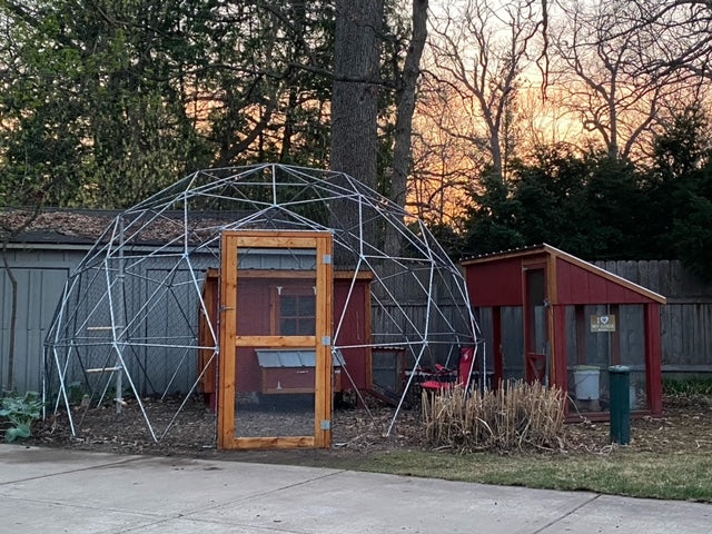 Photo of a 16 ft aviary with 2 inch avian netting and an internal chicken coop.